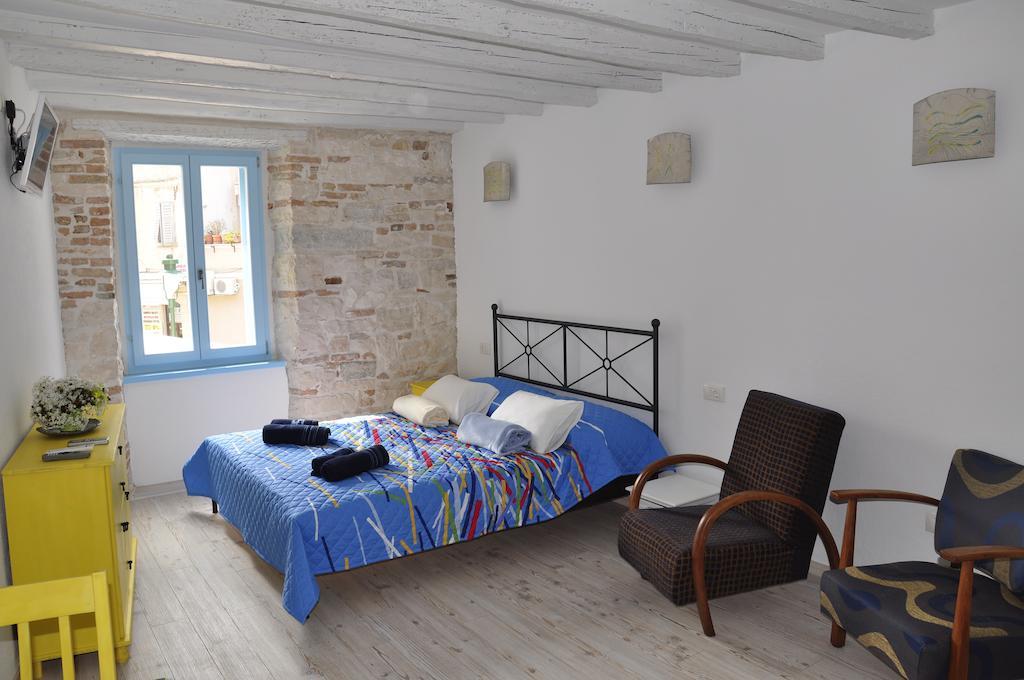 Studios Barbaro โรวีน ห้อง รูปภาพ